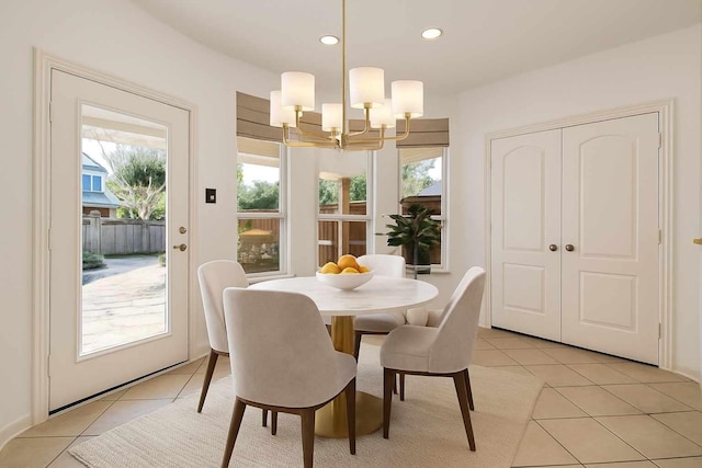 6423 Middlelake Ct, Katy, TX 77450 - dining area featuring a chandelier, light tile patterned floors, and recessed lighting