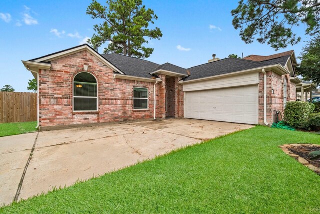 23803 Spring Way Dr, Spring, TX 77373 - ranch-style house featuring brick siding, an attached garage, concrete driveway, and a shingled roof