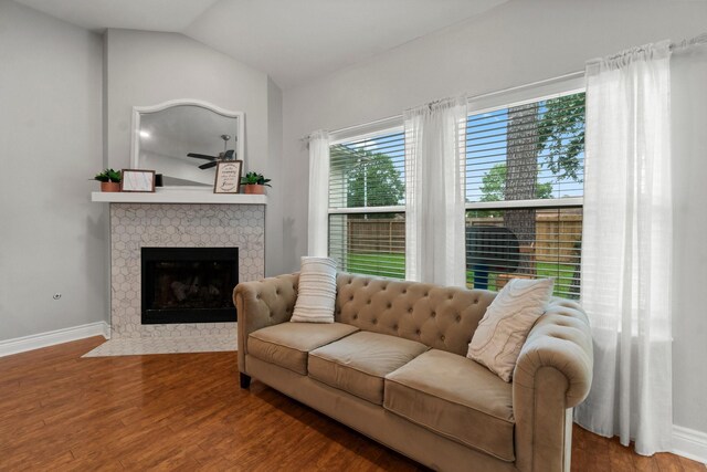 23803 Spring Way Dr, Spring, TX 77373 - living room featuring wood finished floors, a fireplace, and lofted ceiling