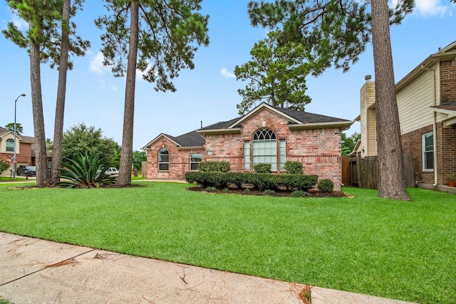 23803 Spring Way Dr, Spring, TX 77373 - view of front of property with brick siding and a shingled roof
