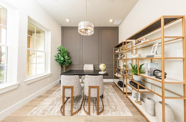 19207 Seabiscuit Stable Trl, Tomball, TX 77377 - dining area with light wood-type flooring, recessed lighting, a decorative wall, and an office area