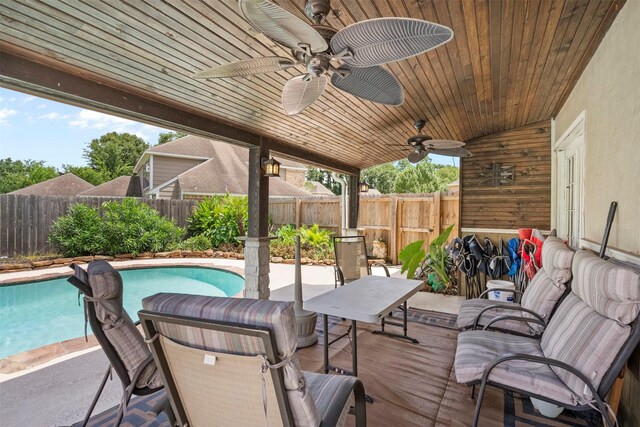 19511 Oak Station Dr, Humble, TX 77346 - fenced backyard featuring a ceiling fan