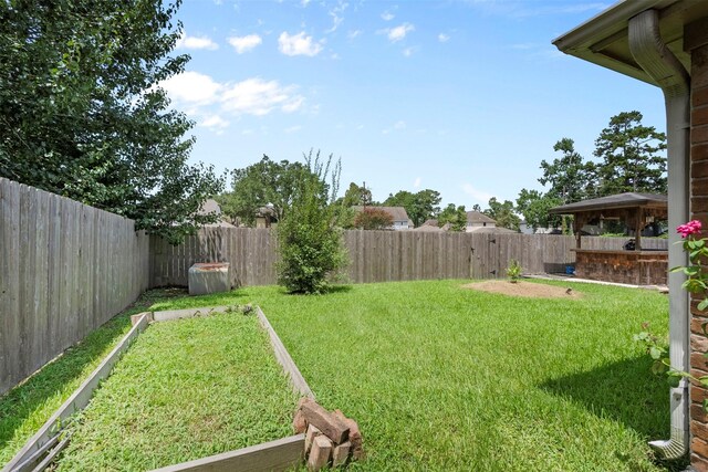 19511 Oak Station Dr, Humble, TX 77346 - fenced backyard featuring a gazebo