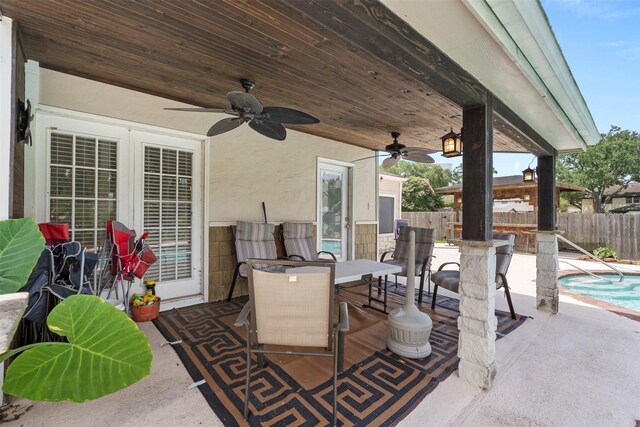19511 Oak Station Dr, Humble, TX 77346 - view of patio / terrace with ceiling fan and outdoor dining area