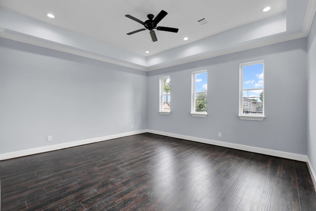 2811 Wichita St, Houston, TX 77004 - spare room with a raised ceiling, dark wood-style flooring, a ceiling fan, ornamental molding, and recessed lighting