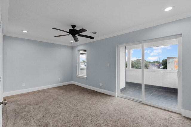 2811 Wichita St, Houston, TX 77004 - unfurnished bedroom featuring access to exterior, carpet floors, multiple windows, recessed lighting, and crown molding