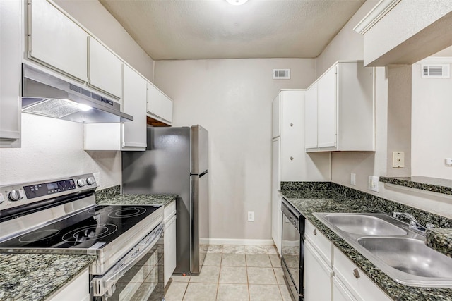 1330 Old Spanish Trl Unit 5106, Houston, TX 77054 - kitchen with stainless steel electric range oven, under cabinet range hood, dishwashing machine, white cabinetry, and light tile patterned floors
