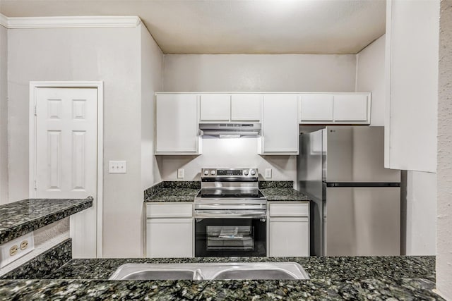 1330 Old Spanish Trl Unit 5106, Houston, TX 77054 - kitchen featuring under cabinet range hood, stainless steel appliances, white cabinets, and dark stone countertops
