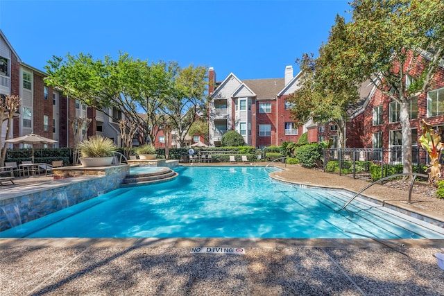 1330 Old Spanish Trl Unit 5106, Houston, TX 77054 - view of swimming pool with a pool with connected hot tub and a residential view