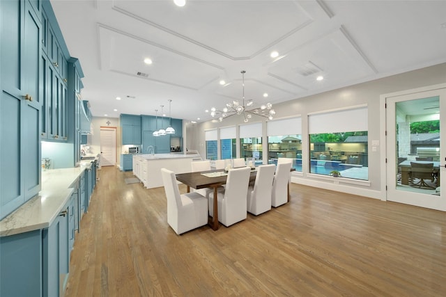 1353 Chantilly Ln, Houston, TX 77018 - dining space featuring a chandelier, light wood finished floors, recessed lighting, and coffered ceiling
