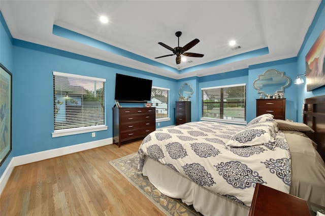 1353 Chantilly Ln, Houston, TX 77018 - bedroom with a tray ceiling, light wood-style floors, ceiling fan, and recessed lighting