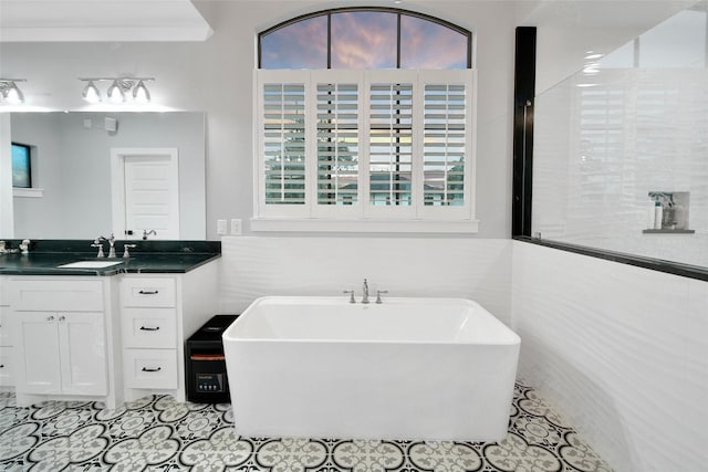 1353 Chantilly Ln, Houston, TX 77018 - bathroom with a freestanding tub and vanity
