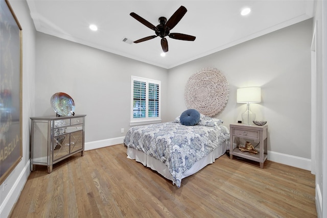 1353 Chantilly Ln, Houston, TX 77018 - bedroom featuring wood finished floors, ornamental molding, recessed lighting, and ceiling fan