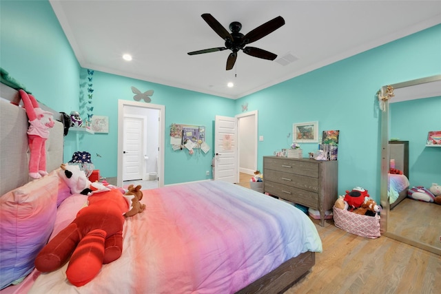 1353 Chantilly Ln, Houston, TX 77018 - bedroom with wood finished floors, ornamental molding, recessed lighting, and a ceiling fan