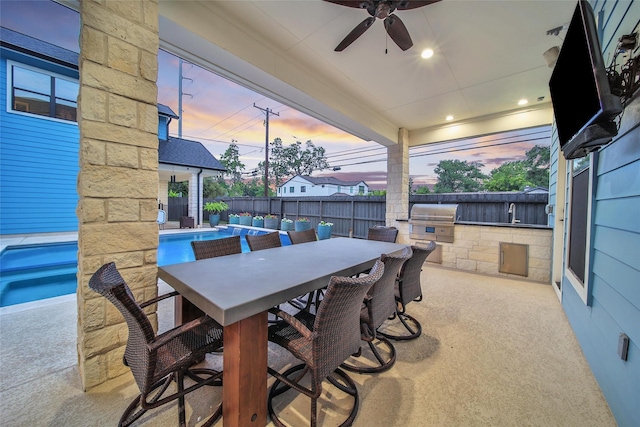 1353 Chantilly Ln, Houston, TX 77018 - view of patio featuring exterior kitchen, a ceiling fan, and outdoor dining space