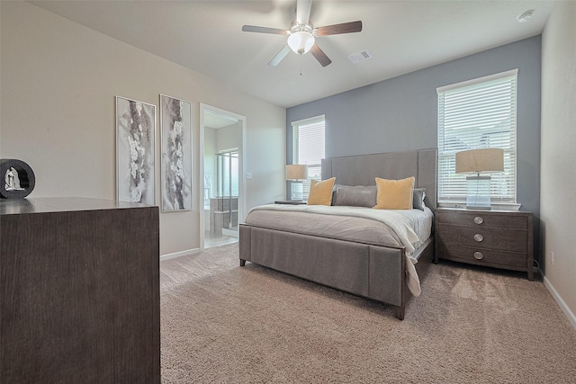2526 Granberry Pt, Missouri City, TX 77459 - carpeted bedroom featuring ensuite bath and ceiling fan