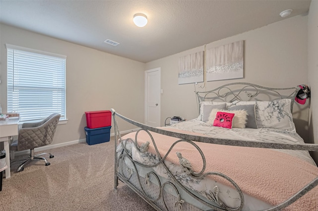 2526 Granberry Pt, Missouri City, TX 77459 - carpeted bedroom featuring baseboards and an office area