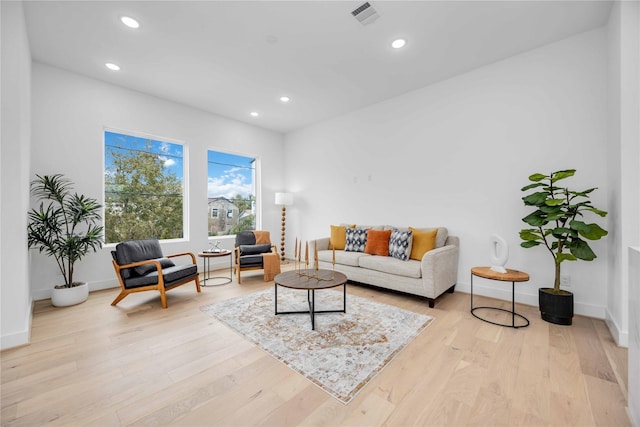 2506 Tierwester St, Houston, TX 77004 - living room with light wood-style floors and recessed lighting