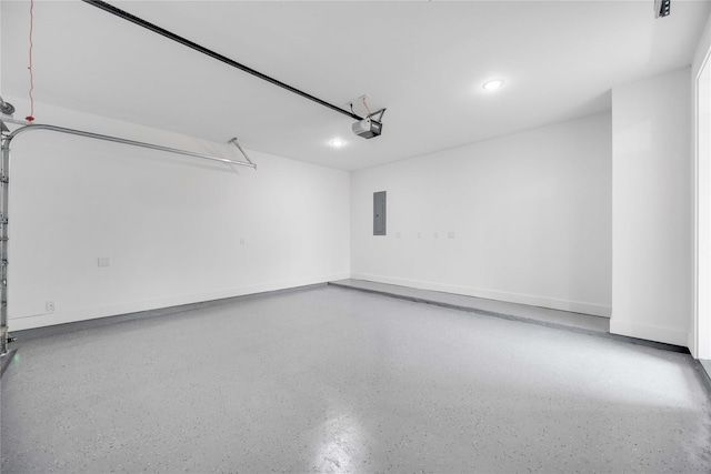 2506 Tierwester St, Houston, TX 77004 - garage featuring a garage door opener, electric panel, and recessed lighting