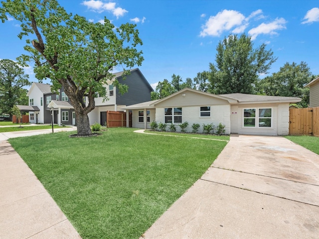 2515 Garapan St, Houston, TX 77091 - view of front of house with concrete driveway and brick siding