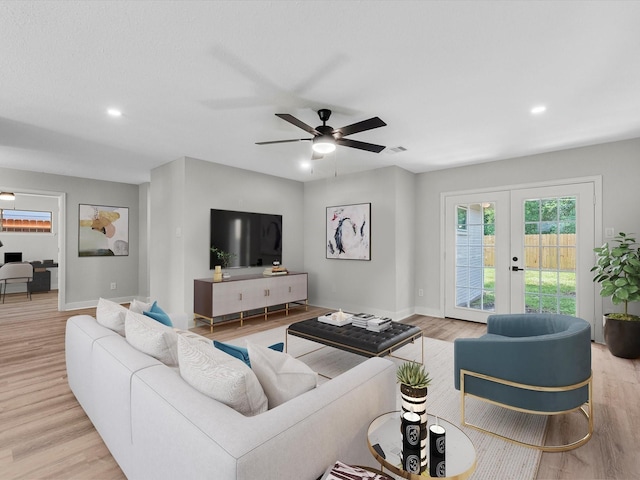 2515 Garapan St, Houston, TX 77091 - living room featuring wood finished floors, french doors, recessed lighting, and ceiling fan