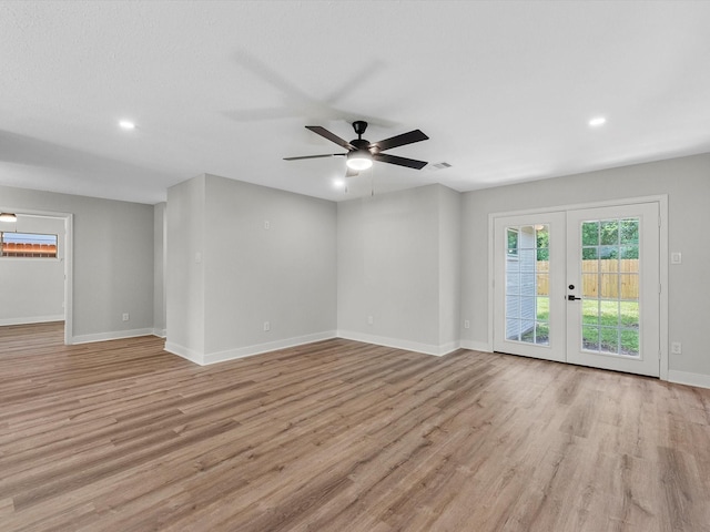 2515 Garapan St, Houston, TX 77091 - unfurnished room featuring light wood-style floors, recessed lighting, a ceiling fan, and french doors