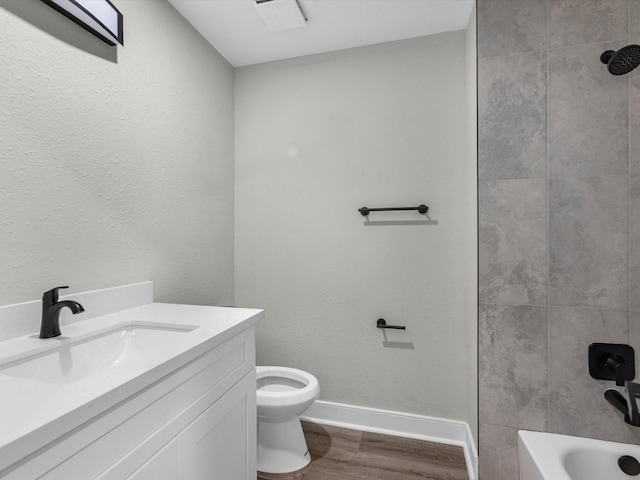 2515 Garapan St, Houston, TX 77091 - bathroom with wood finished floors, vanity, and  shower combination
