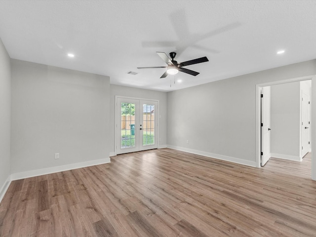 2515 Garapan St, Houston, TX 77091 - unfurnished room with light wood-type flooring, a ceiling fan, french doors, and recessed lighting