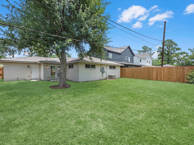 2515 Garapan St, Houston, TX 77091 - view of yard featuring french doors