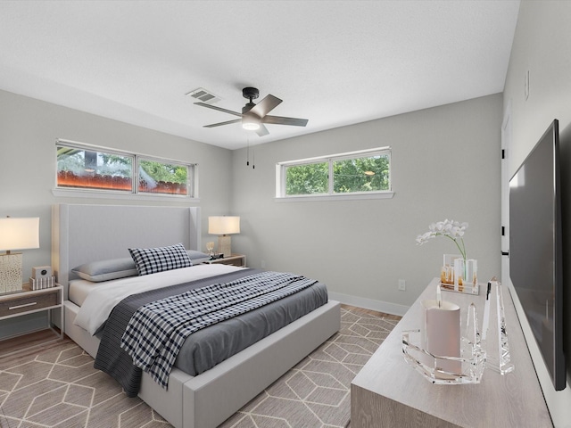 2515 Garapan St, Houston, TX 77091 - bedroom featuring baseboards and ceiling fan