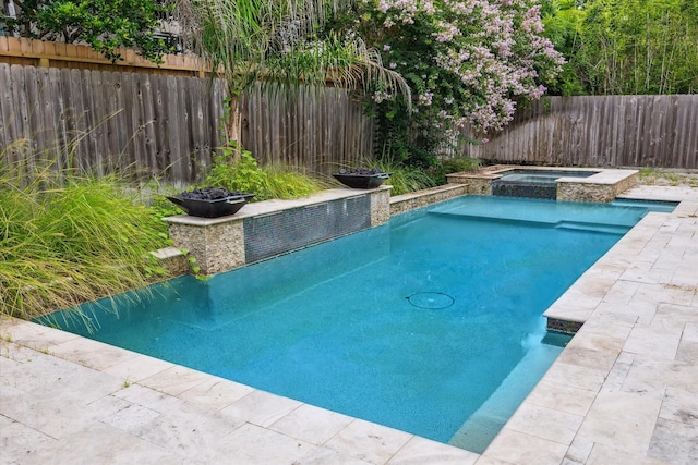 3310 Glen Haven Blvd, Houston, TX 77025 - view of pool with a fenced backyard, a pool with connected hot tub, and a patio area
