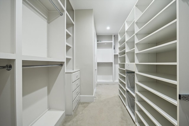 3310 Glen Haven Blvd, Houston, TX 77025 - walk in closet featuring light carpet