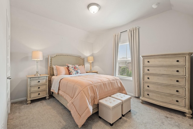 6023 Dovetail Cliff Ct, Katy, TX 77493 - bedroom with light colored carpet and vaulted ceiling