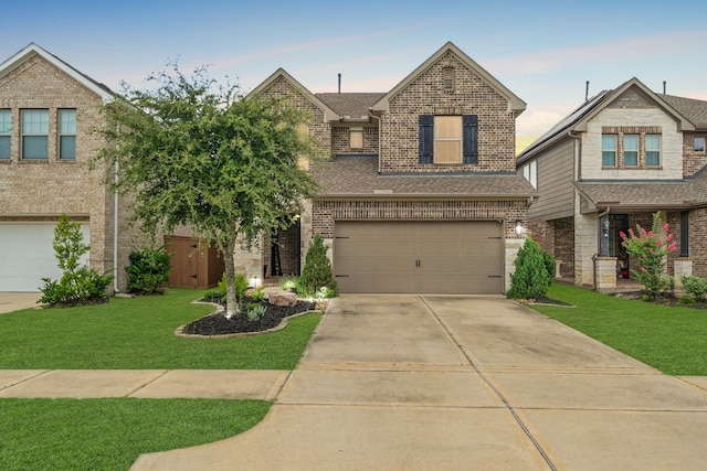 6023 Dovetail Cliff Ct, Katy, TX 77493 - traditional-style home with brick siding, driveway, a front yard, and a garage