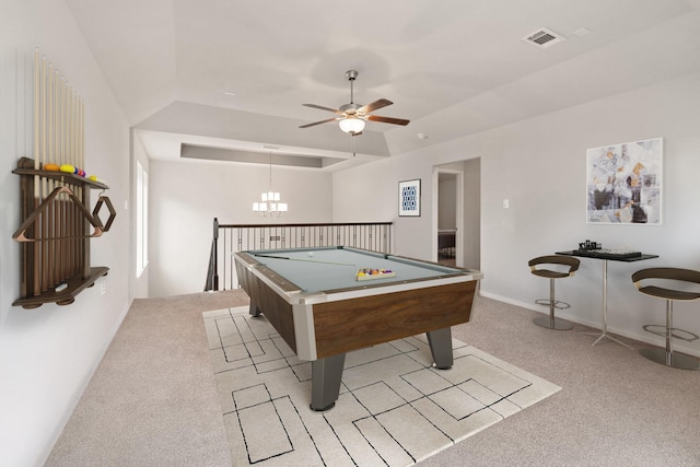 6023 Dovetail Cliff Ct, Katy, TX 77493 - game room with a raised ceiling, light colored carpet, a ceiling fan, a chandelier, and billiards