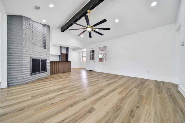9622 Clanton St, Houston, TX 77080 - unfurnished living room with ceiling fan, a fireplace, light wood finished floors, and recessed lighting