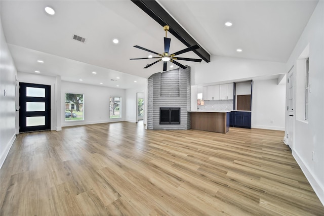 9622 Clanton St, Houston, TX 77080 - unfurnished living room featuring a ceiling fan, a large fireplace, light wood-type flooring, and recessed lighting