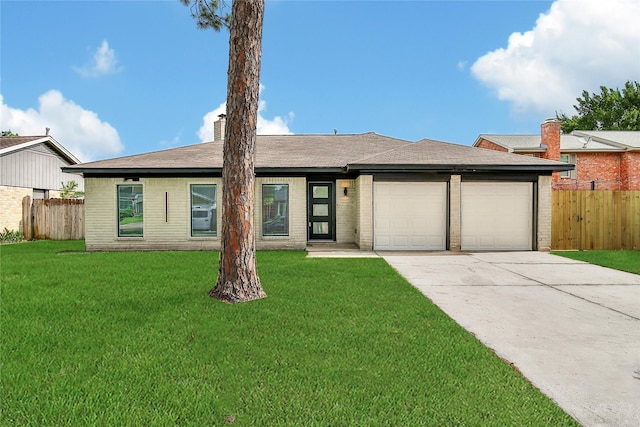 9622 Clanton St, Houston, TX 77080 - view of front of house featuring an attached garage, concrete driveway, a chimney, and brick siding