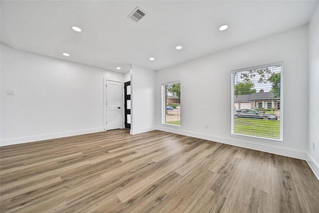 9622 Clanton St, Houston, TX 77080 - empty room featuring recessed lighting and light wood-style flooring