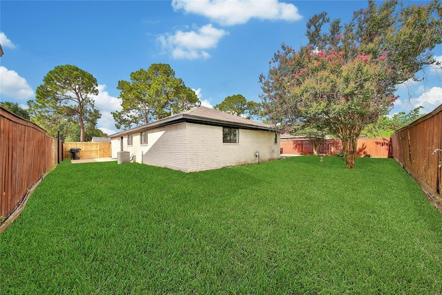 9622 Clanton St, Houston, TX 77080 - rear view of house with brick siding and a fenced backyard