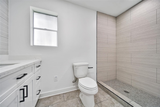 9622 Clanton St, Houston, TX 77080 - bathroom with vanity, a tile shower, and tile patterned floors