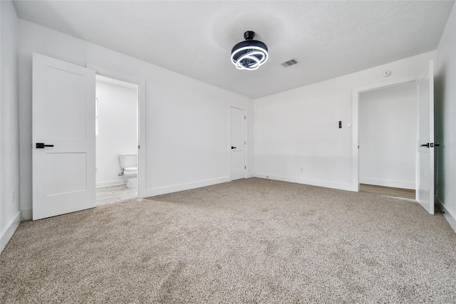 9622 Clanton St, Houston, TX 77080 - unfurnished bedroom featuring carpet floors and ensuite bathroom