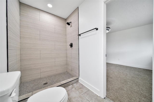 9622 Clanton St, Houston, TX 77080 - full bathroom with a tile shower, tile patterned floors, and recessed lighting