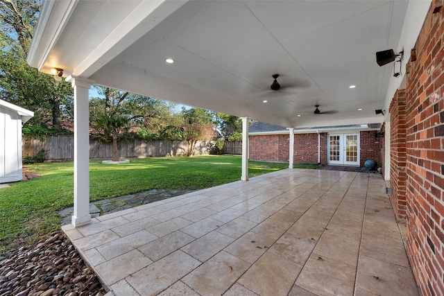 9210 Rangely Dr, Houston, TX 77055 - fenced backyard with a patio and french doors