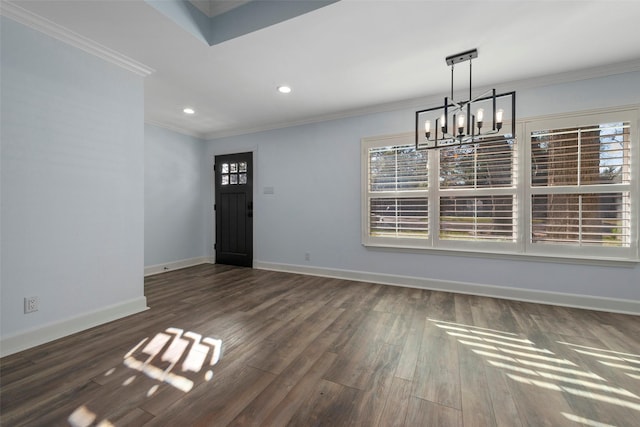 9210 Rangely Dr, Houston, TX 77055 - unfurnished dining area featuring ornamental molding, a chandelier, wood finished floors, healthy amount of natural light, and recessed lighting