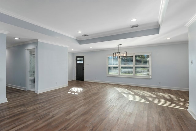 9210 Rangely Dr, Houston, TX 77055 - unfurnished living room with a raised ceiling, healthy amount of natural light, a chandelier, recessed lighting, and ornamental molding