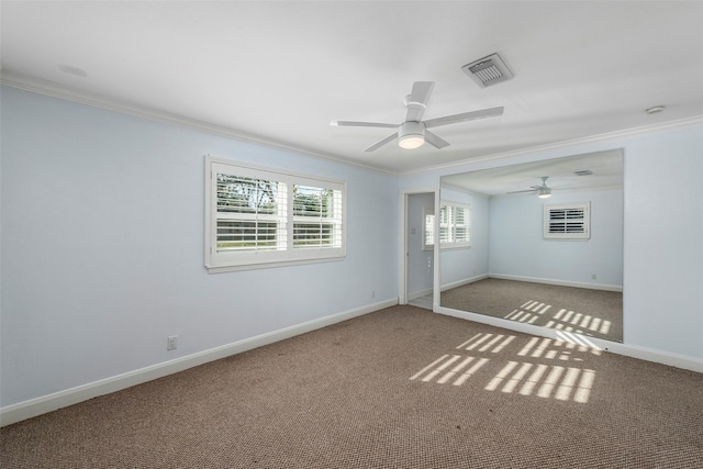 9210 Rangely Dr, Houston, TX 77055 - carpeted empty room with crown molding, a ceiling fan, and a smoke detector