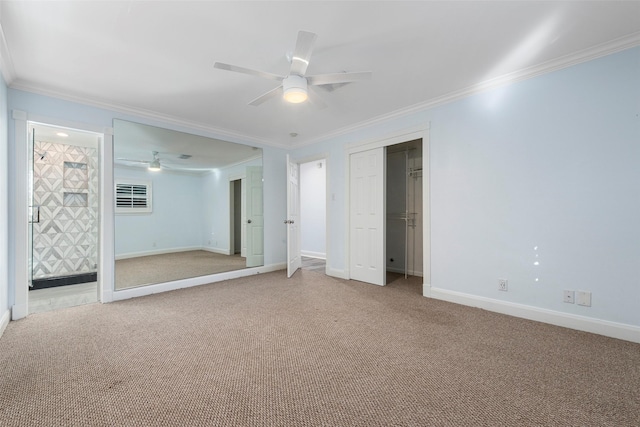 9210 Rangely Dr, Houston, TX 77055 - unfurnished bedroom with crown molding, carpet floors, a ceiling fan, ensuite bathroom, and a closet