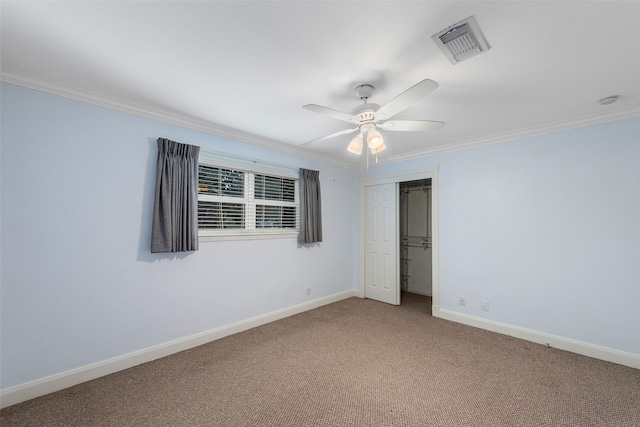 9210 Rangely Dr, Houston, TX 77055 - unfurnished bedroom with carpet, ornamental molding, a closet, and ceiling fan