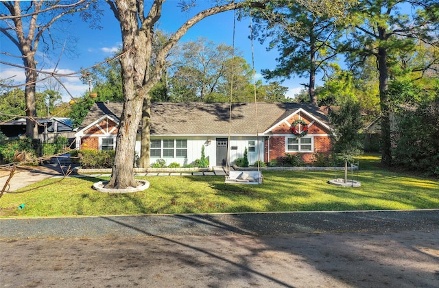 9210 Rangely Dr, Houston, TX 77055 - view of front of home with a front yard and brick siding
